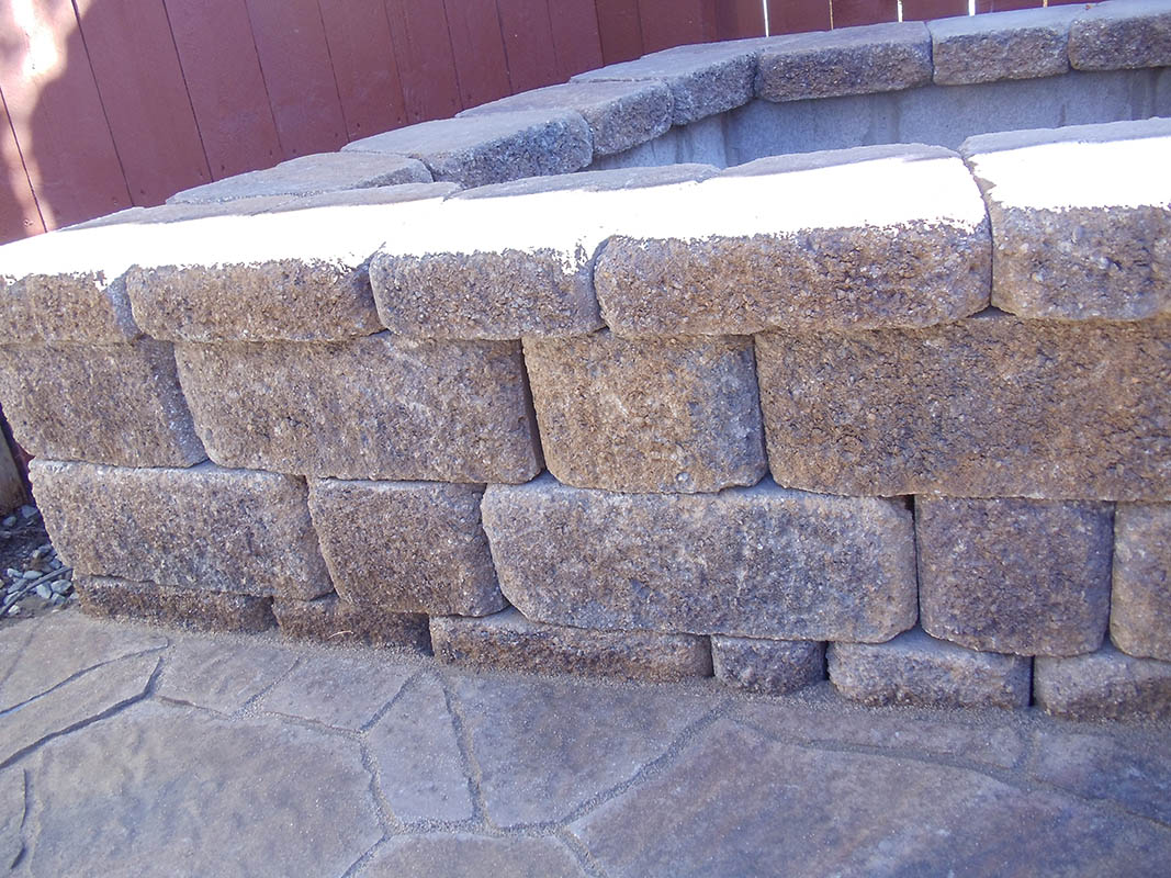 Custom brick masonry steps with bullnose edging matching a natural clay paver landing