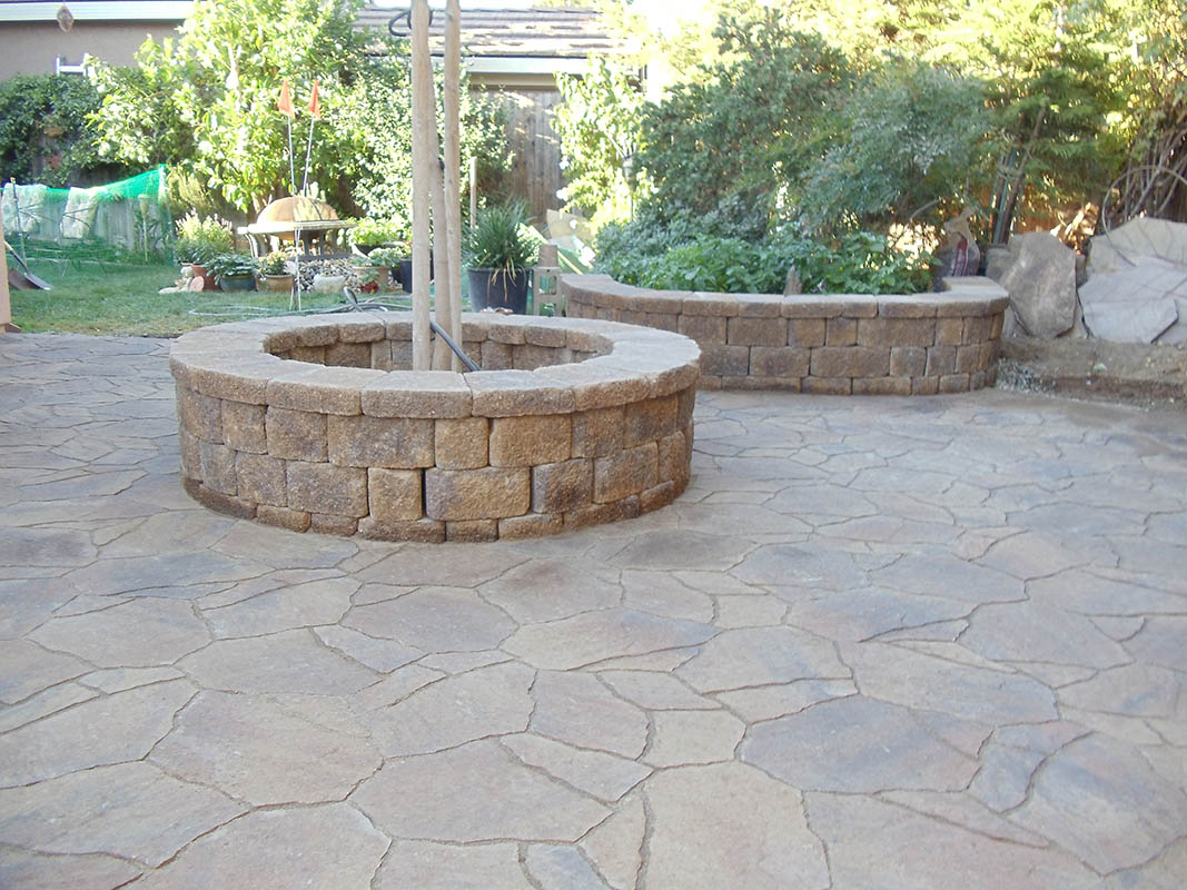 Custom brick masonry steps with bullnose edging matching a natural clay paver landing