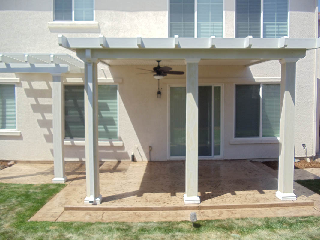 Custom stamped concrete patio with fire pit area installed by Delta Construction in Elk Grove, CA