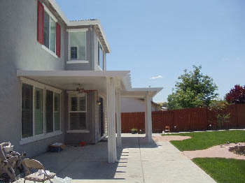 Custom stamped concrete patio with fire pit area installed by Delta Construction in Elk Grove, CA