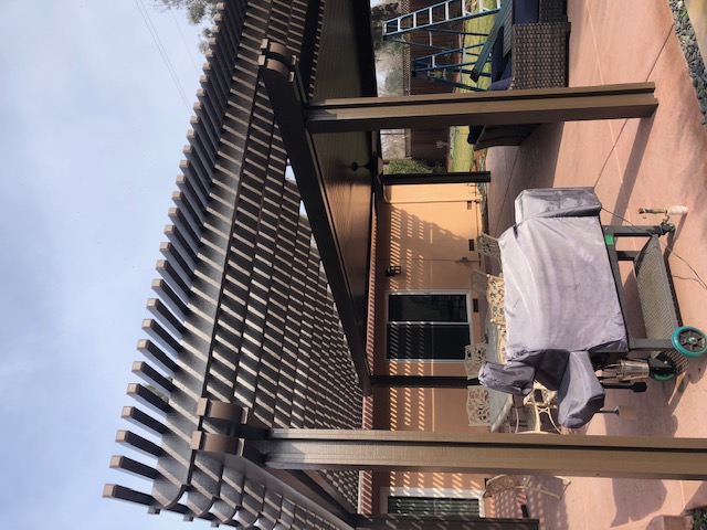 Custom stamped concrete patio with fire pit area installed by Delta Construction in Elk Grove, CA