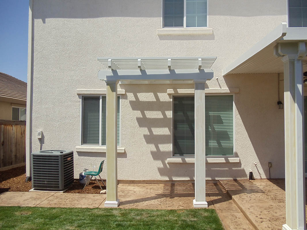 Custom stamped concrete patio with fire pit area installed by Delta Construction in Elk Grove, CA