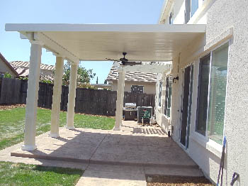 Custom stamped concrete patio with fire pit area installed by Delta Construction in Elk Grove, CA
