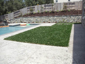 Custom Ashlar Slate stamped concrete pool deck with cool deck finish in Folsom, CA