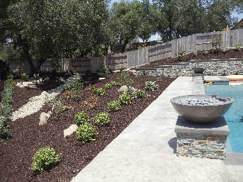 Custom Ashlar Slate stamped concrete pool deck with cool deck finish in Folsom, CA