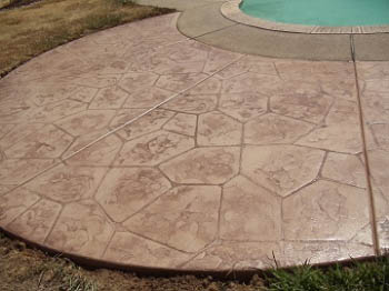 Custom Ashlar Slate stamped concrete pool deck with cool deck finish in Folsom, CA