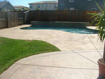 Custom Ashlar Slate stamped concrete pool deck with cool deck finish in Folsom, CA