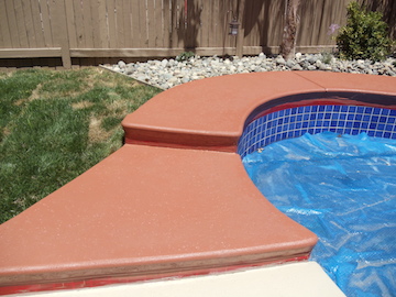 Custom Ashlar Slate stamped concrete pool deck with cool deck finish in Folsom, CA