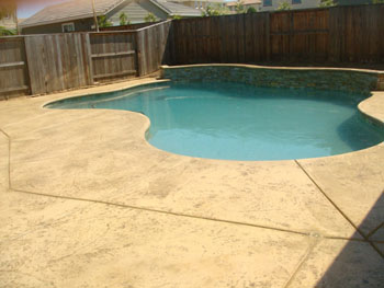 Custom Ashlar Slate stamped concrete pool deck with cool deck finish in Folsom, CA