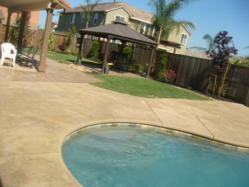 Custom Ashlar Slate stamped concrete pool deck with cool deck finish in Folsom, CA
