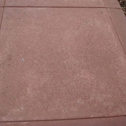 Close up of a slip resistant salt rock finish concrete pool deck in Elk Grove, CA