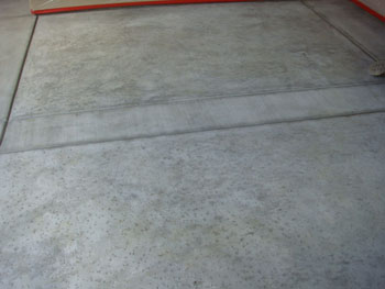 Close up of a slip resistant salt rock finish concrete pool deck in Elk Grove, CA