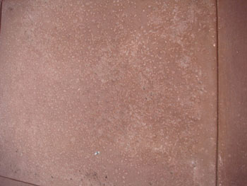 Close up of a slip resistant salt rock finish concrete pool deck in Elk Grove, CA