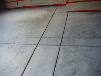 Close up of a slip resistant salt rock finish concrete pool deck in Elk Grove, CA