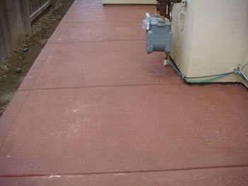 Curved stamped concrete walkway with charcoal border in Elk Grove, CA