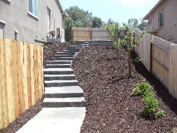 Custom poured concrete steps with Ashlar Slate stamped finish in Elk Grove, CA