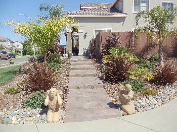 Custom poured concrete steps with Ashlar Slate stamped finish in Elk Grove, CA