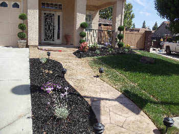 Custom poured concrete steps with Ashlar Slate stamped finish in Elk Grove, CA