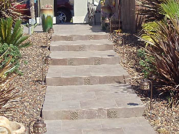 Custom poured concrete steps with Ashlar Slate stamped finish in Elk Grove, CA