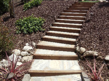 Custom poured concrete steps with Ashlar Slate stamped finish in Elk Grove, CA