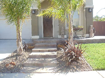 Custom poured concrete steps with Ashlar Slate stamped finish in Elk Grove, CA