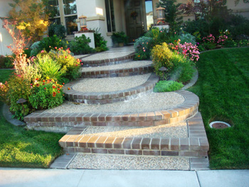 Custom poured concrete steps with Ashlar Slate stamped finish in Elk Grove, CA