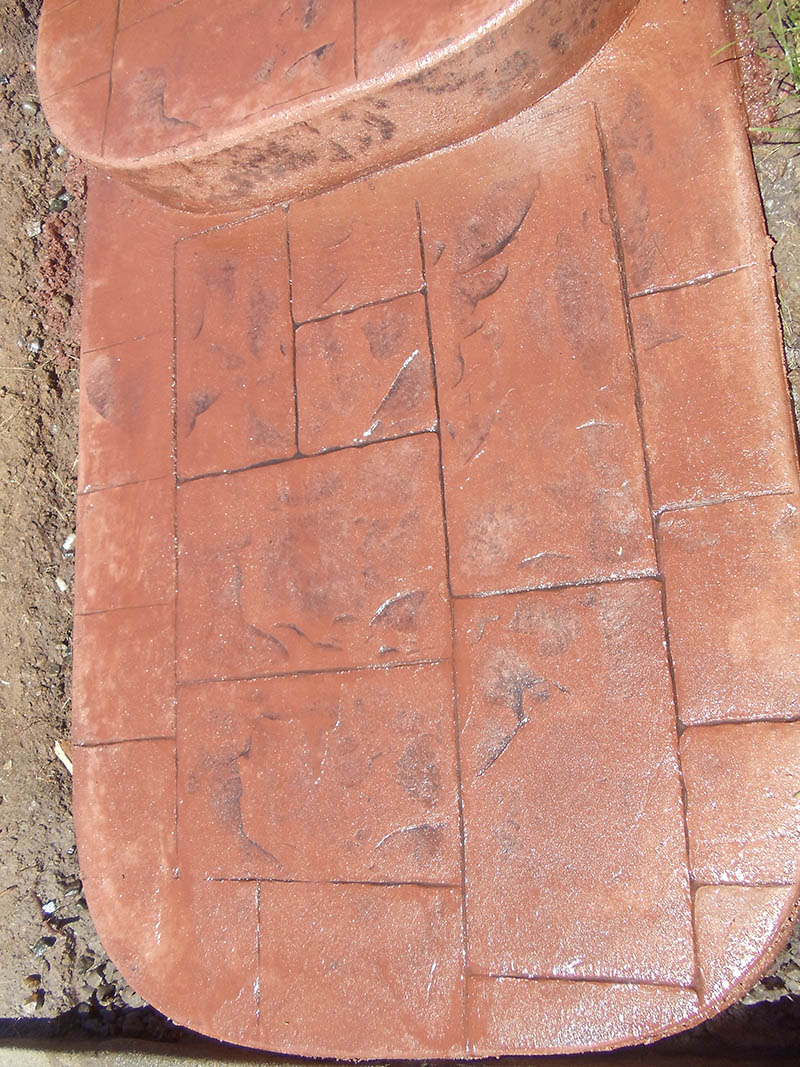 Custom poured concrete steps with Ashlar Slate stamped finish in Elk Grove, CA
