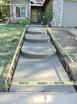 Custom poured concrete steps with Ashlar Slate stamped finish in Elk Grove, CA