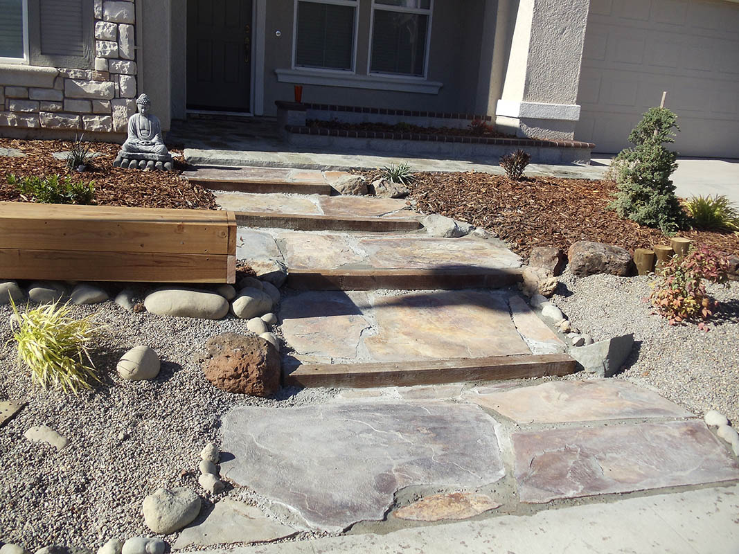 Custom poured concrete steps with Ashlar Slate stamped finish in Elk Grove, CA